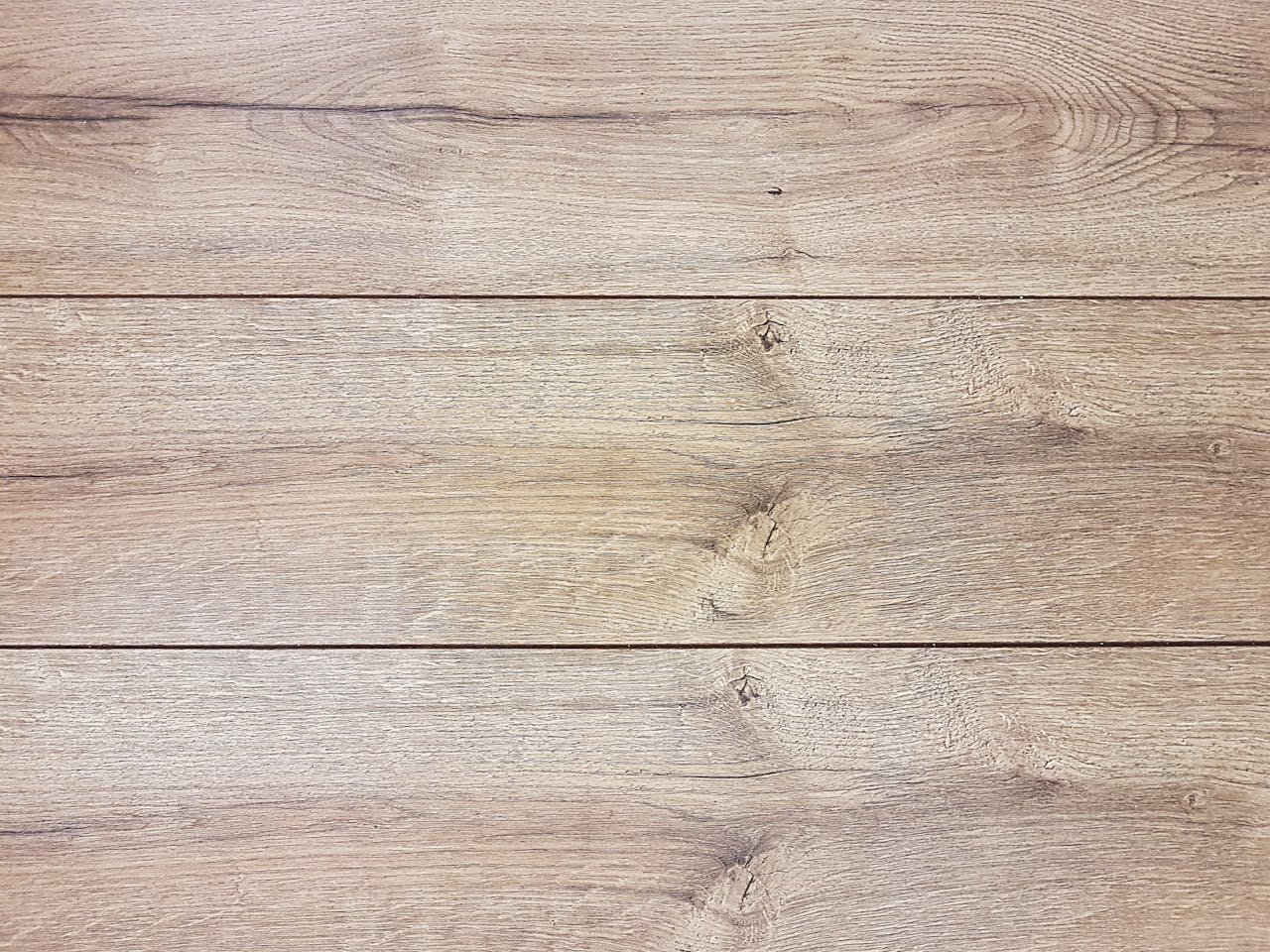 High-resolution image of a rustic wooden plank texture, ideal for backgrounds and design projects.